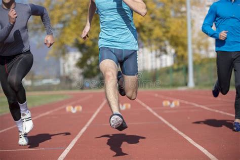 Athletes at the Sprint Start Line in Track and Field Stock Image - Image of forward, event ...