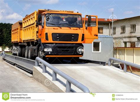 Orange Truck with Grain is Weighed on the Scales in the Grain Storage Area. Truck Scales Stock ...