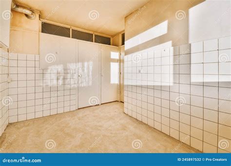 A Spacious Empty Room With White Tiles Stock Photo Image Of Design