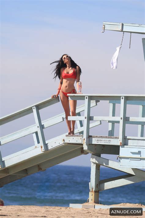 Tania Marie Sexy In A Skimpy Bikini As She Hits The Beach During A Water Photoshoot In