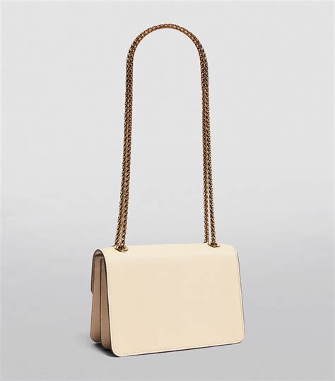 Strathberry white Mini Leather East West Bag | Harrods UK