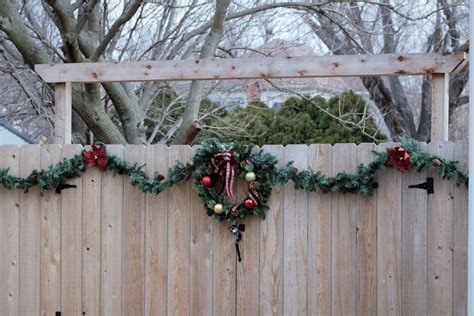 Christmas Fence Wreath With Poinsettia Garland