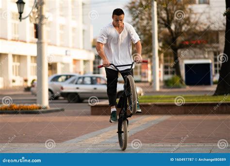 The Guy On The Bmx Bike Releases His Hands In A Jump Stock Image