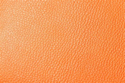 Premium Photo Texture Of The Leather Orange Golden