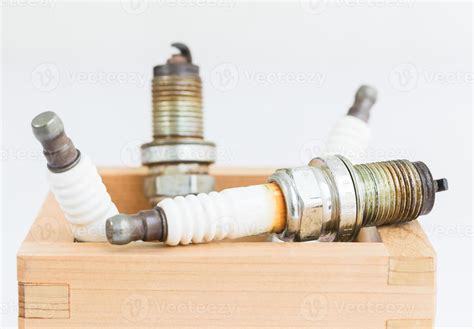 spark plug  wood box  stock photo  vecteezy
