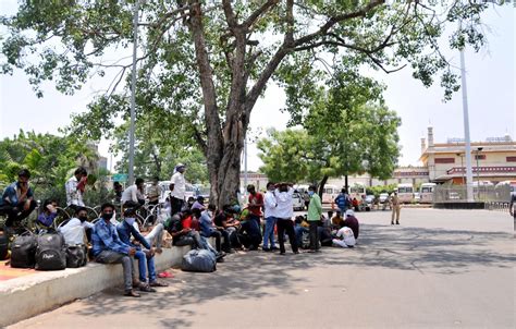 Inter-state passengers wait at Nampally railway station