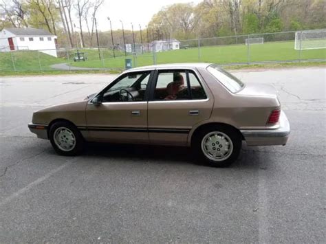 1987 Plymouth Sundance Hatchback Brown FWD Automatic for sale