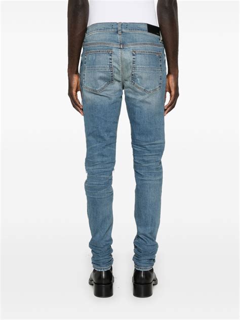 AMIRI MX1 Distressed Effect Skinny Jeans Blue FARFETCH