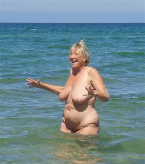 Naked Old Beach Granny Reacts To The Cold Water Look At That Beautiful