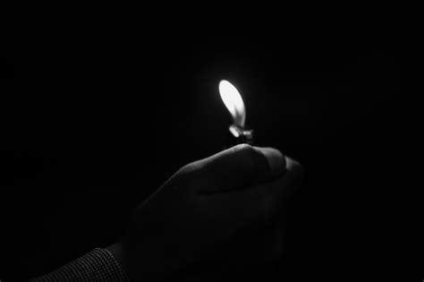 Close-up of Hand Holding Candle in Darkroom · Free Stock Photo