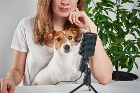 Premium Photo Woman Recording Podcast With Her Dog Remote Work At