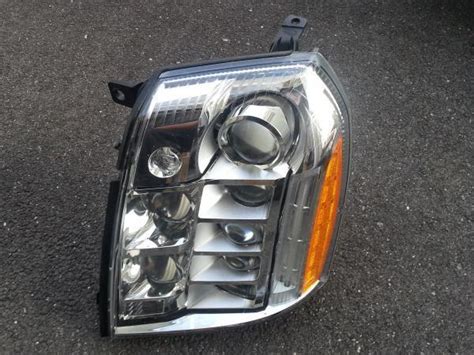 Sell 07 13 OEM CADILLAC ESCALADE PLATINUM EDITION FRONT HEADLIGHT LEFT