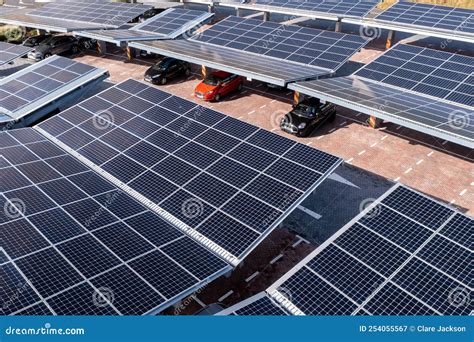 Aerial View Of Solar Panels On A Parking Lot Rooftop Editorial