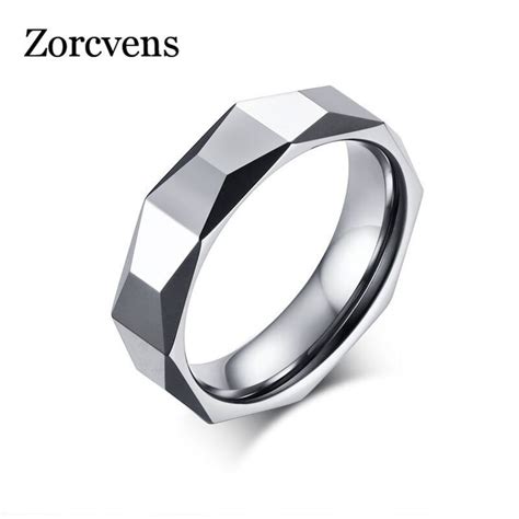 An Image Of A Wedding Ring Made Out Of Stainless Steel With Black And