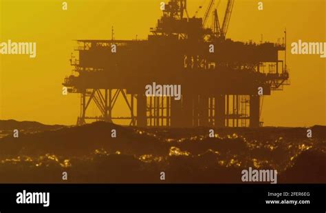 Coastal Oil Production Platform Sunset Stock Video Footage Alamy