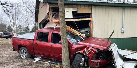 Driver Extricated After Vehicle Hits Garage At Sechrist Lake