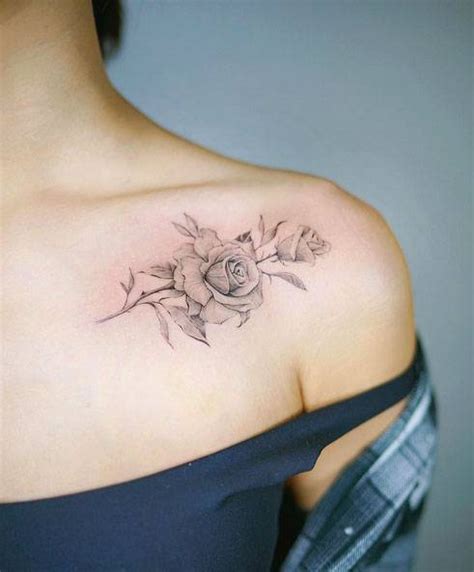 Fine Line Rose Tattoo On The Left Shoulder