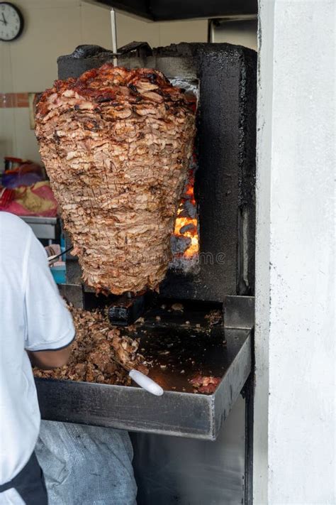 Food Trompo Pastor Tacos Al Pastor Beef Stacked In Sauce With Spices