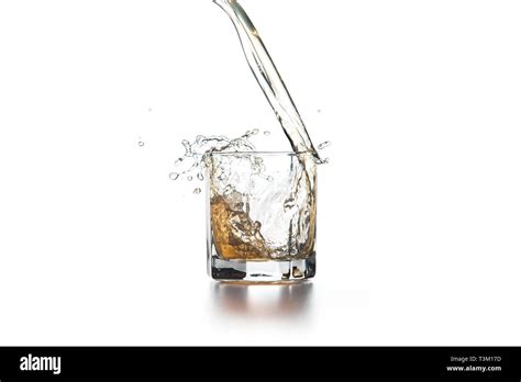 Whiskey Splash Out Of Glass Many Drops Of Beverage Get Out From Glass