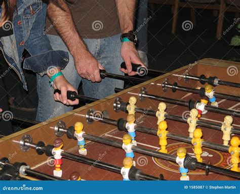 Players at Foosball Table stock image. Image of competition - 1585087