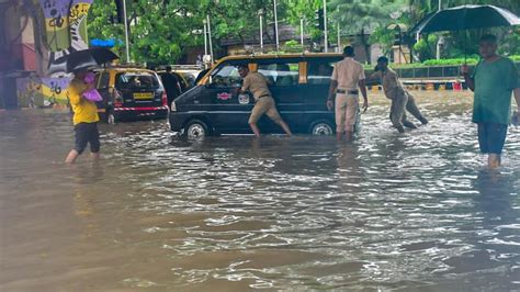 Mumbai Rain Weather Update Heavy Downpour Batter City Commuters Battle