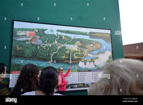 Our Guide Showing The Map With Details Of The Iguazu Falls To Tourists