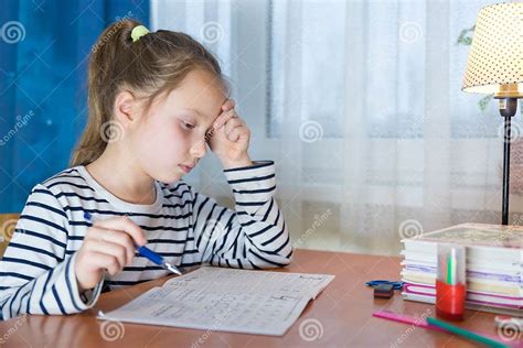 Dreamy Little Girl Sit At Desk Studying Look In Distance Visualizing Or