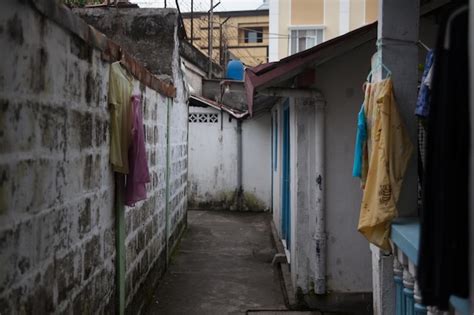 Premium Photo Narrow Lane Amidst Buildings