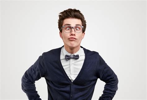 Premium Photo Young Male Nerd Student In Bow Tie And Eyeglasses