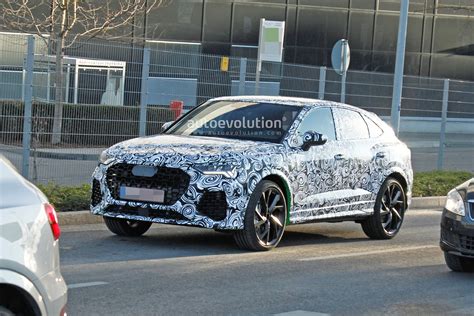 Audi Rs Q4 Spied In Lambo Green Looks Like A Baby Urus Autoevolution