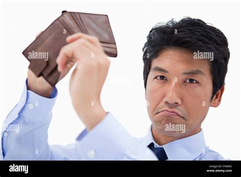 Businessman Showing His Empty Wallet Stock Photo Alamy