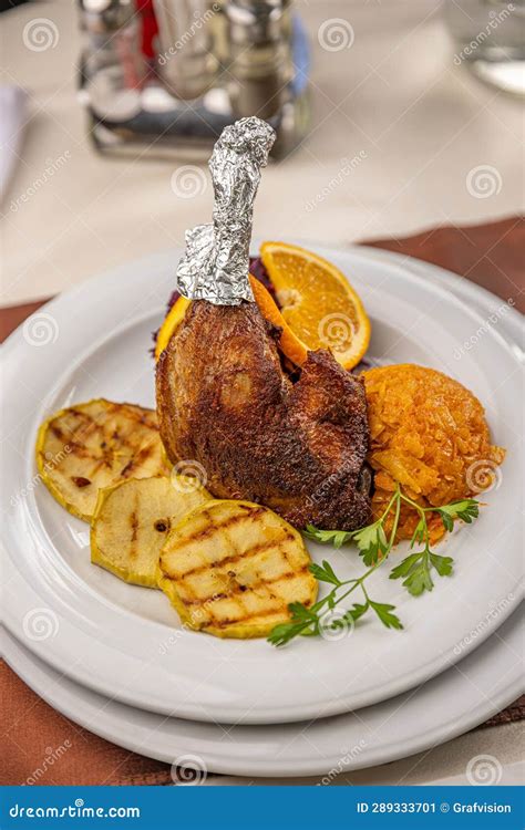 Plate of roast duck legs stock image. Image of food - 289333701