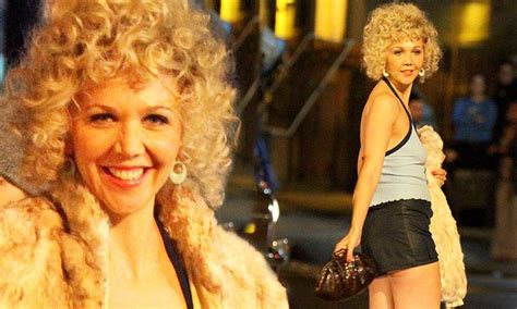 Maggie Gyllenhaal Beams In Curly Blonde Wig For Prostitute Role In The