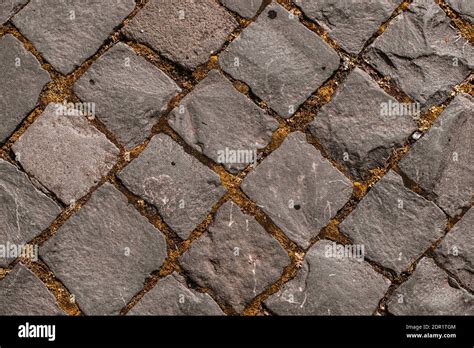 Stone Pavement In Perspective Abstract Background Of Old Cobblestone