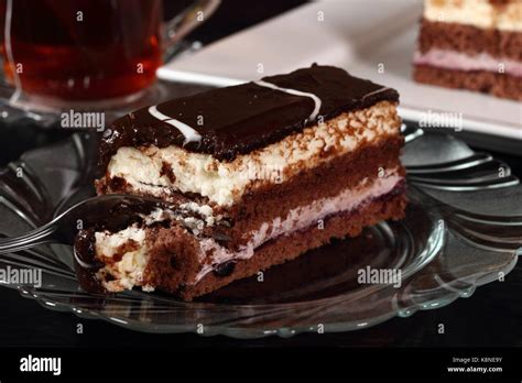 Layer Cake With Fruit And Cream Fillings Decorated Chocolate Icing