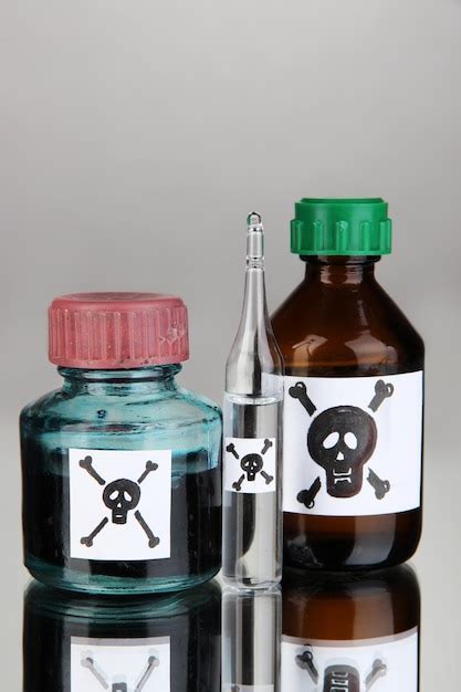 Premium Photo Deadly Poison In Bottles On Grey Background