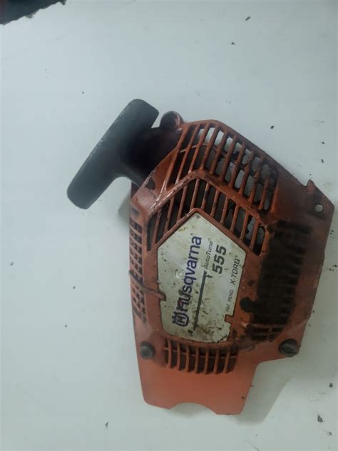 Piła Husqvarna 555 560 XP Szarpak starter rozrusznik 12oo PIHUS555 14j