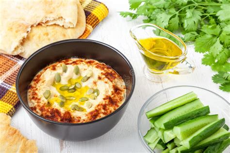 Hummus With Cucumber Sticks Stock Image Image Of Cuisine Leaf 123273089