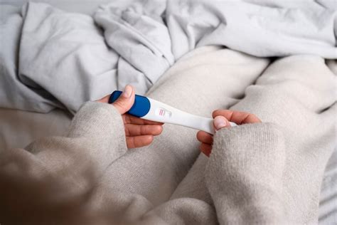 Free Photo High Angle Woman Holding Positive Pregnancy Test