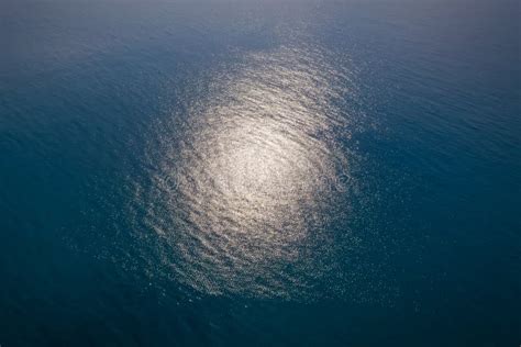 Aerial Top Down View Photo Of Azure Blue Ocean Waves Showing Beautiful