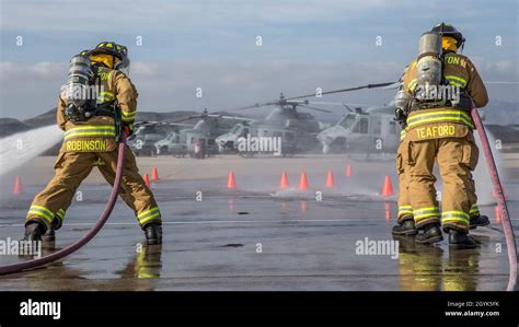 Us Marines With Aircraft Rescue And Firefighting Headquarters And Headquarters Squadron