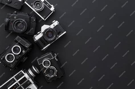 Premium Photo Cameras On Black Background