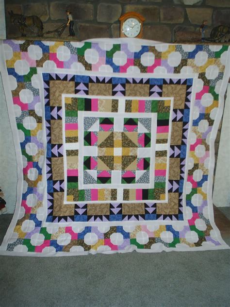 Lori's Puff - n - Stuff: Round Robin Quilt Tops