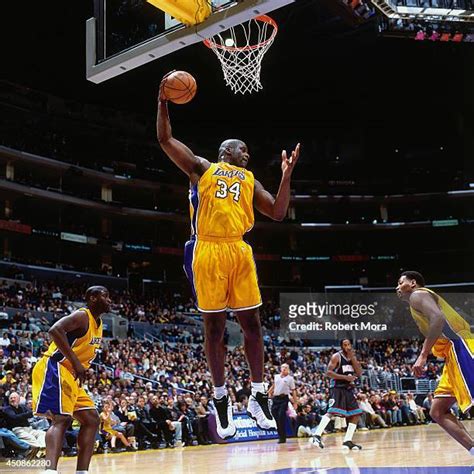 Shaquille Oneal Holding Photos and Premium High Res Pictures - Getty Images