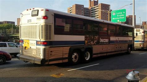 MTA Bus Company 2002 MCI D4500 2878 On The QM3 Express Bus Route At