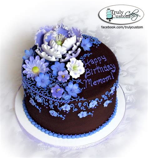 Chocolate Buttercream With Purple And Lavendar Flowers And Piping