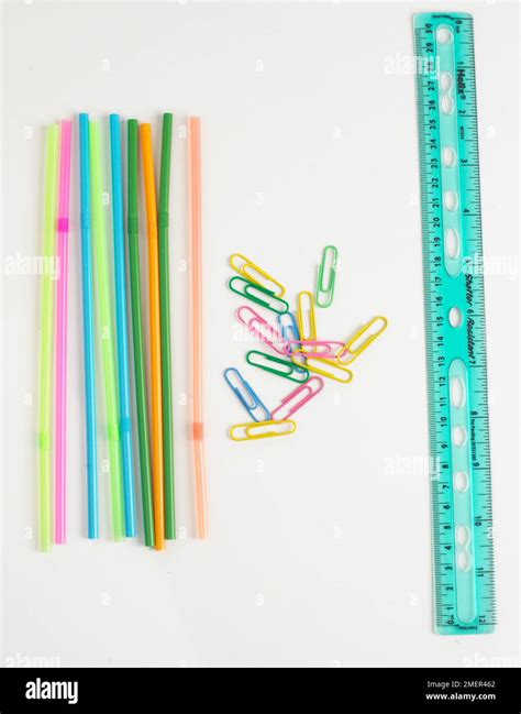 Colourful Drinking Straws Paper Clips And A Ruler Stock Photo Alamy