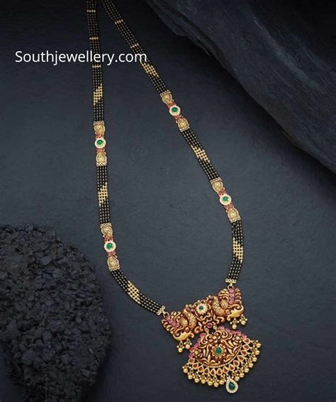 Nallapusalu Danda With Peacock Nakshi Pendant Indian Jewellery Designs