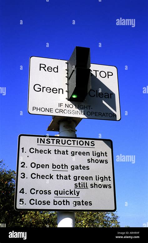 Sign At Unmanned Railway Level Crossing Somerton Oxfordshire England