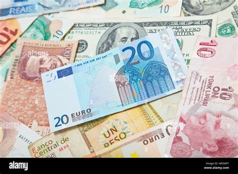 Background from paper money of the different countries. European euro in the middle Stock Photo ...